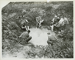 Canadian troops washing in a shell hole, June 1917.
George Metcalf Archival Collection
CWM 19920085-434
O.1531
© Canadian War Museum
