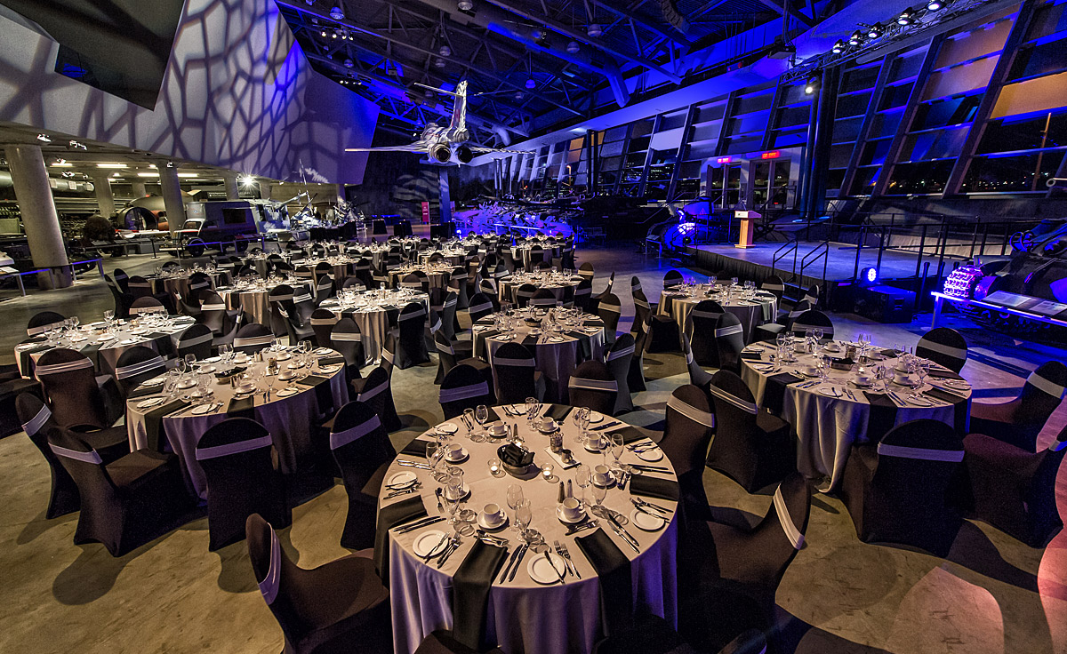 A room with tables and chairs set up in the Canadian War Museum in Ottawa.