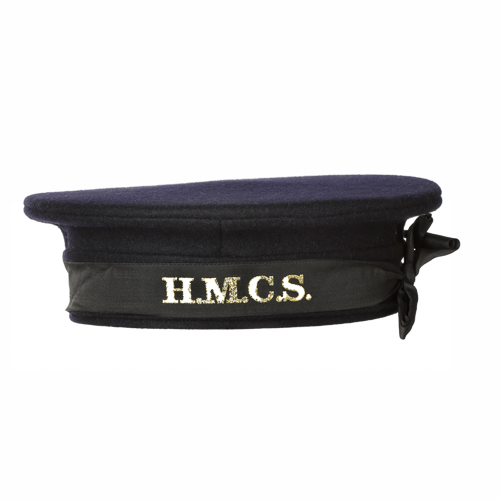 A navy hat with the word "HMCS" on it, available in Ottawa at the Canadian War Museum.