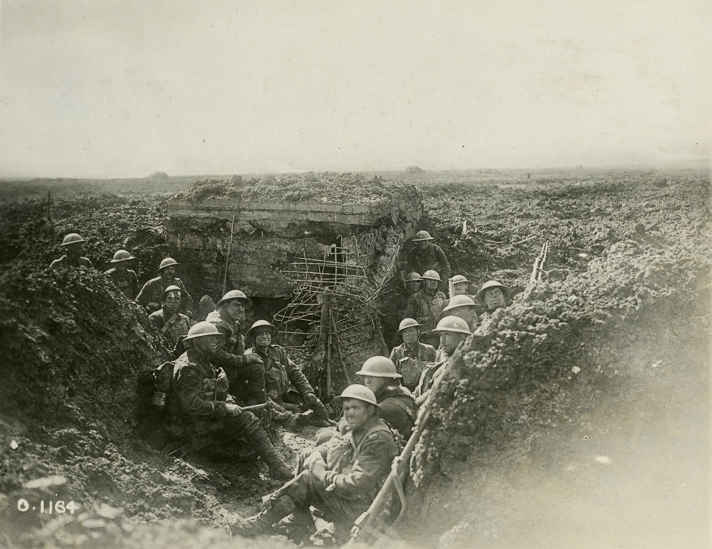 A group of soldiers sitting in a trench at the Canadian War Museum in Ottawa.