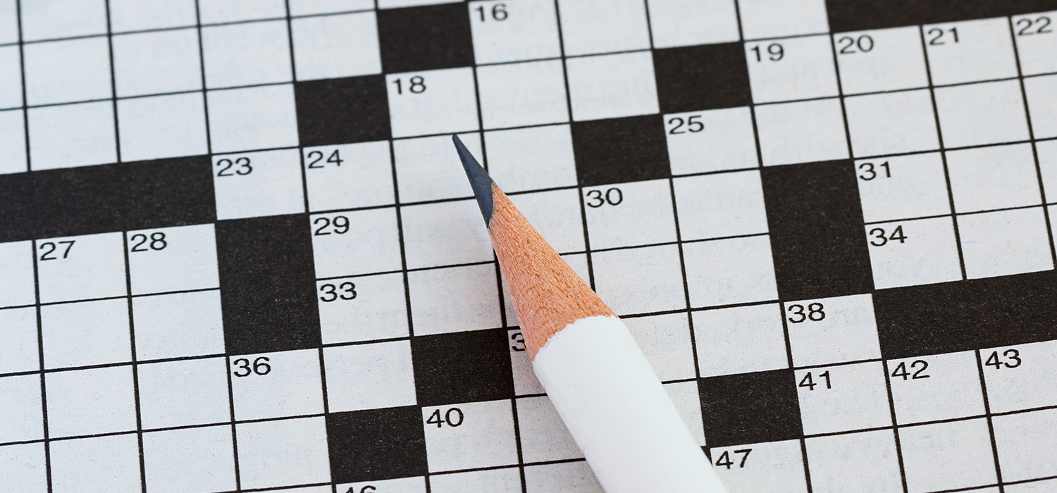 A pencil sits on top of a crossword puzzle in Ottawa.