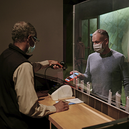 A man wearing a mask visits the Canadian War Museum in Ottawa.