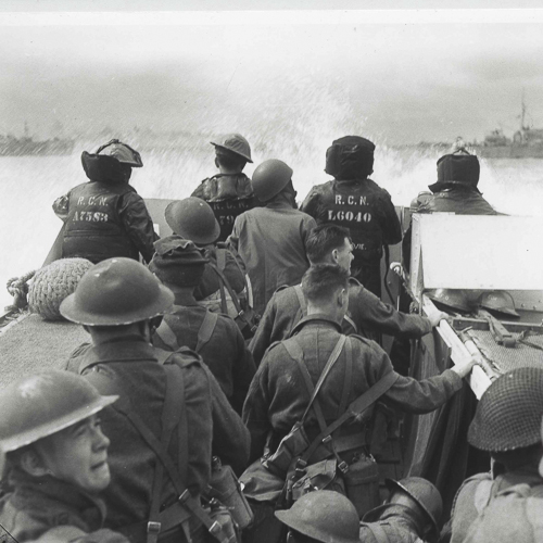 A group of soldiers on a boat.