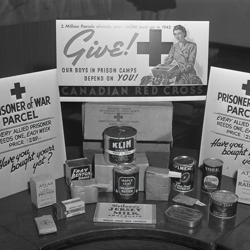 A photo of a table with a variety of items on it, taken in Ottawa at the Canadian War Museum.