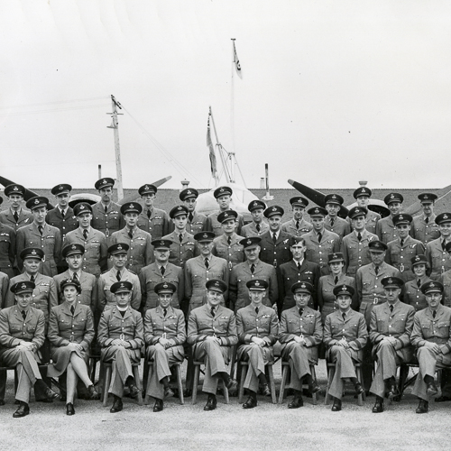 A group of men in uniform posing for a photo at the Canadian War Museum in Ottawa.