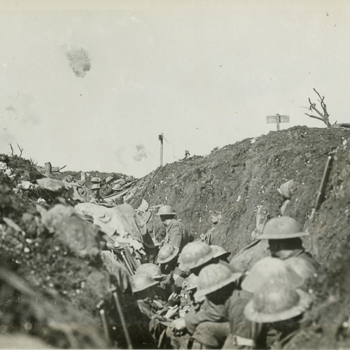 A group of soldiers standing in a trench.