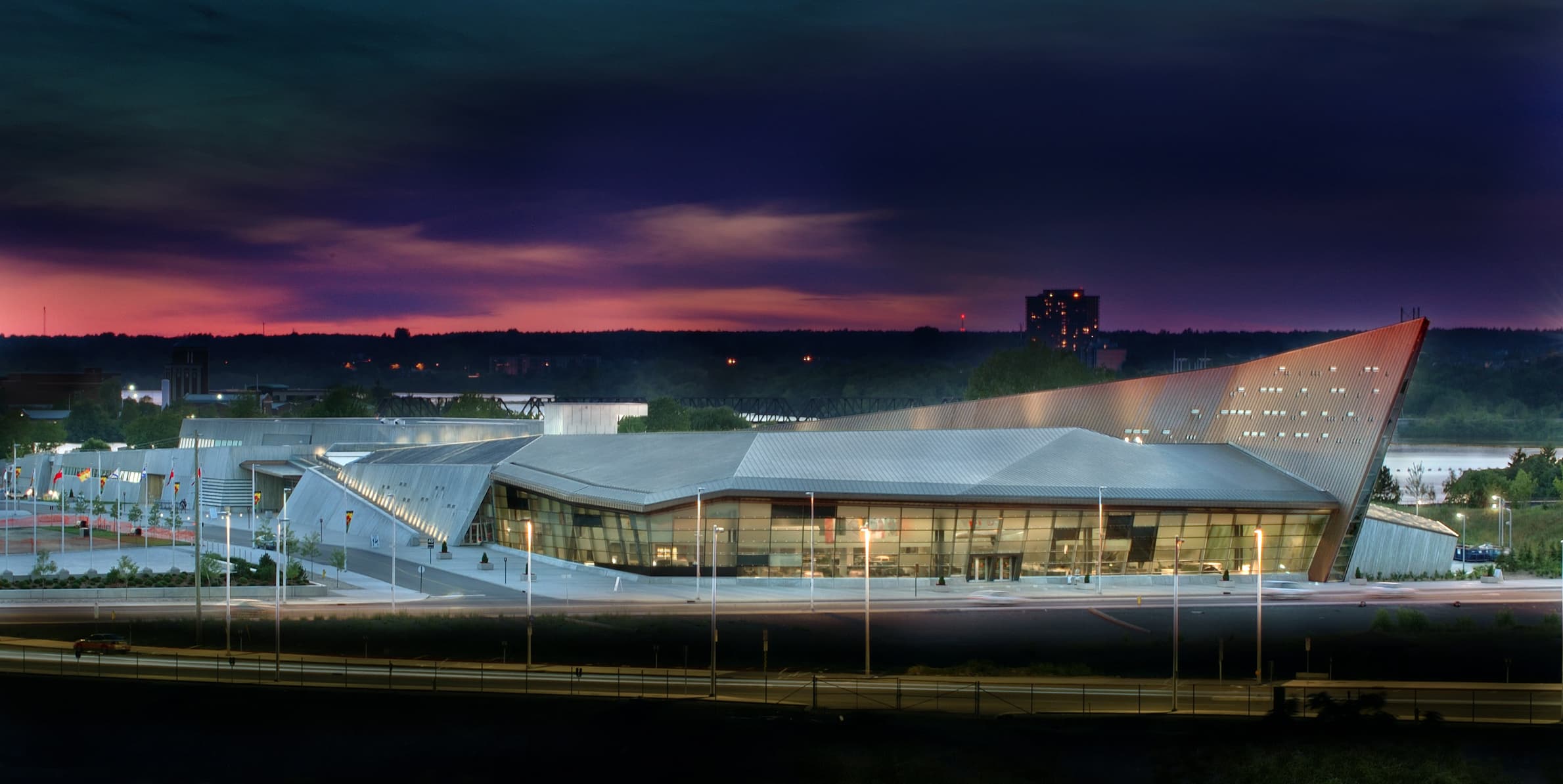 The Canadian War Museum, a modern building in Ottawa, at night.