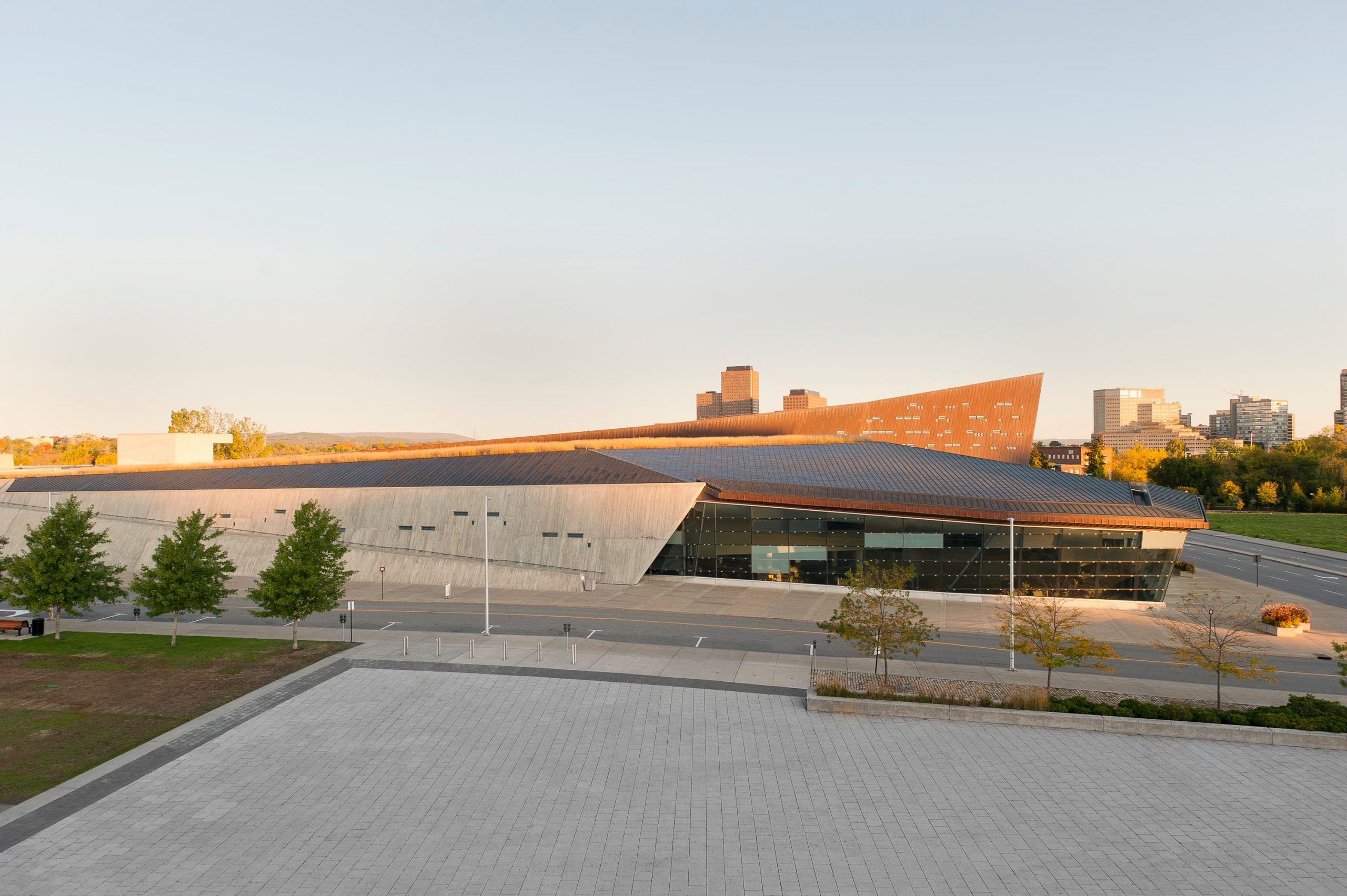 An aerial view of the Canadian War Museum in Ottawa, with the stunning cityscape as its backdrop.