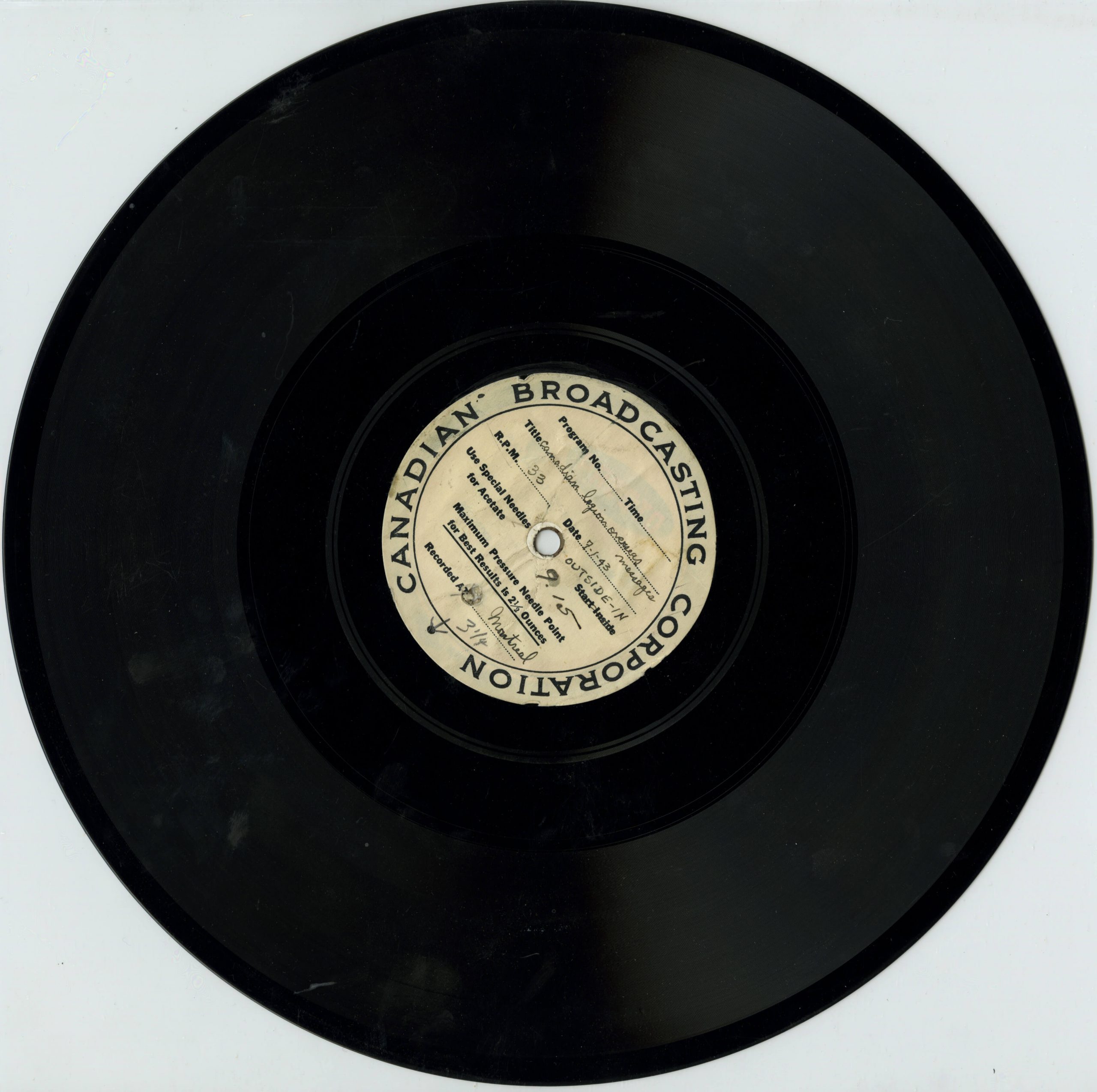 A black record with a white label on it.