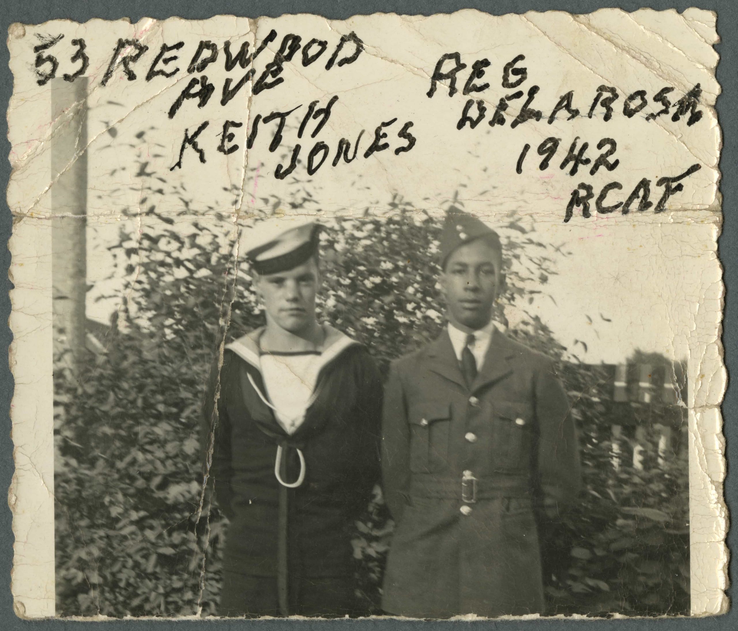 Two men in uniform standing next to each other in Ottawa, at the Canadian War Museum.